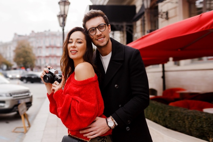 Confident mature woman with a more younger man