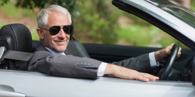 sugar daddy sitting in his car