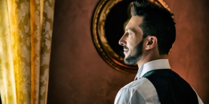 smiling elite man standing indoor