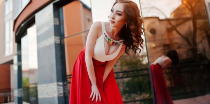 fashionable sugar baby at red dress about 30